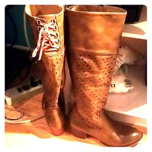 Knee high brown zip up boots with lace back
